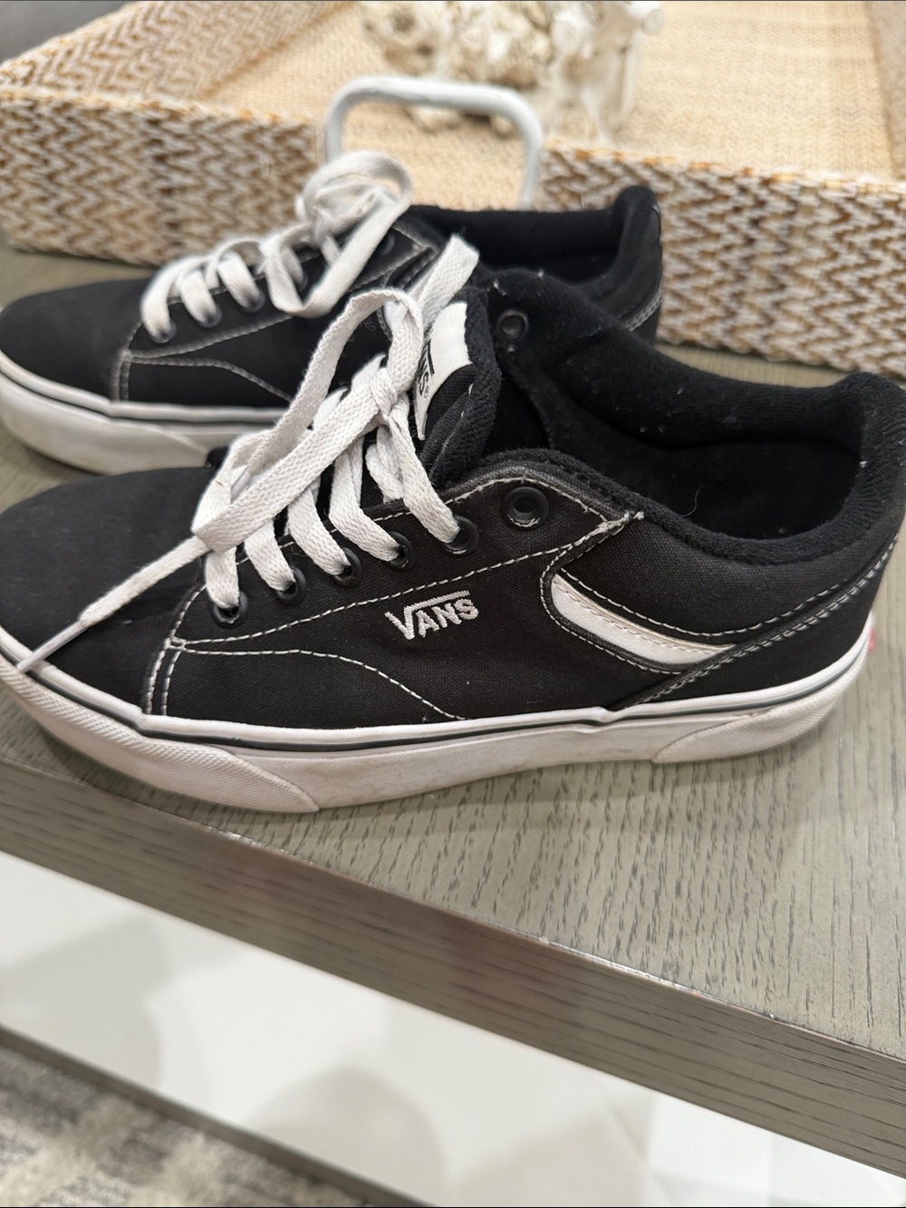 Vans women’s Black and White Low-Top Canvas Skate Sneakers